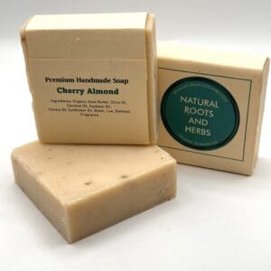 Three soap bars sitting on top of each other.