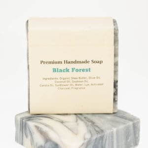 A bar of soap sitting on top of two other bars.