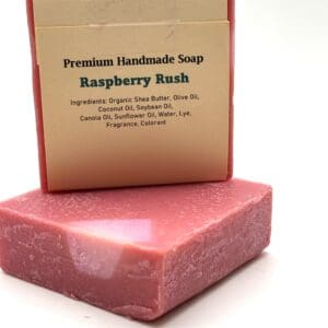 A raspberry bush soap sitting on top of it's box.